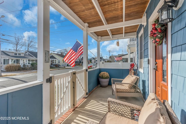 balcony featuring a porch