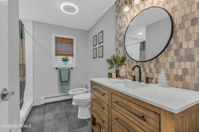 bathroom with toilet, walk in shower, a bidet, vanity, and a baseboard heating unit