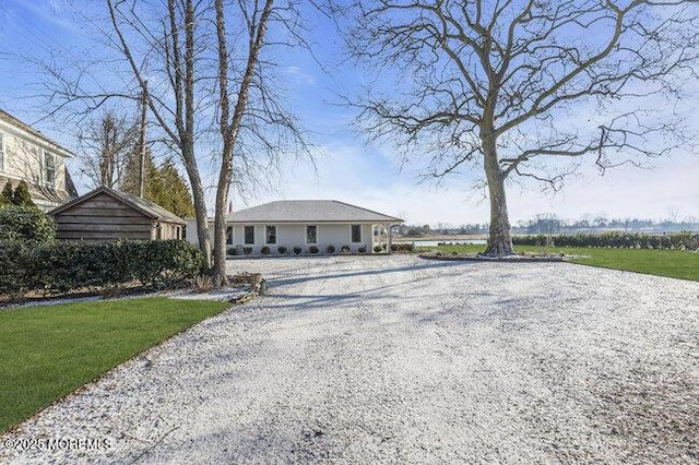 view of front of home with a front lawn