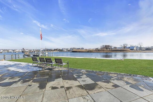 view of patio featuring a water view