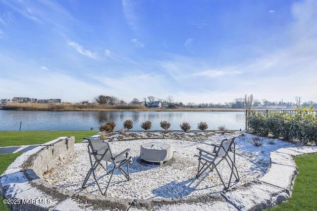 view of patio featuring a water view