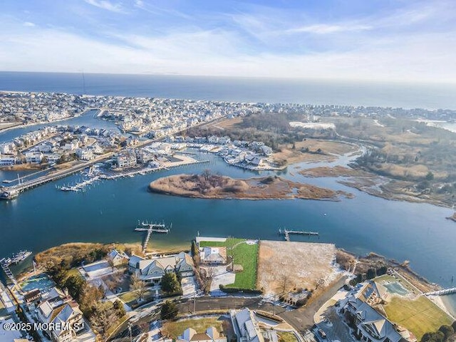 drone / aerial view with a water view