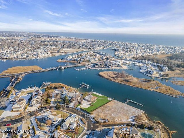 drone / aerial view with a water view