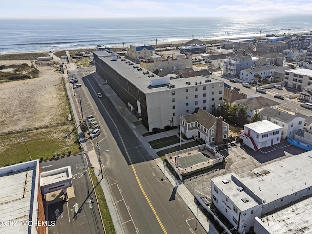 aerial view featuring a water view and a view of the beach