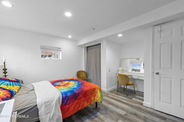 bedroom featuring hardwood / wood-style flooring