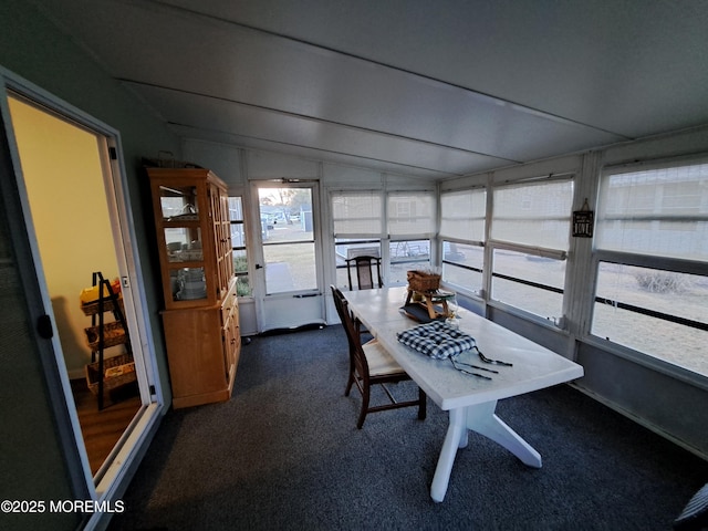 sunroom / solarium with lofted ceiling