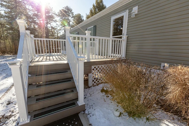 view of snow covered deck