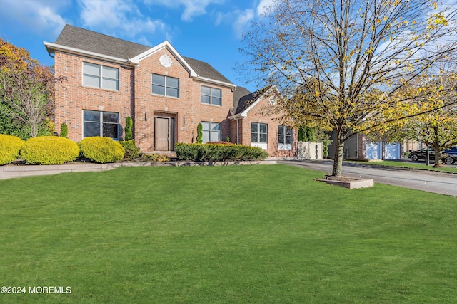 view of front of house with a front lawn