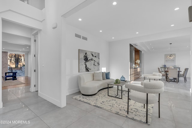 living room with a chandelier