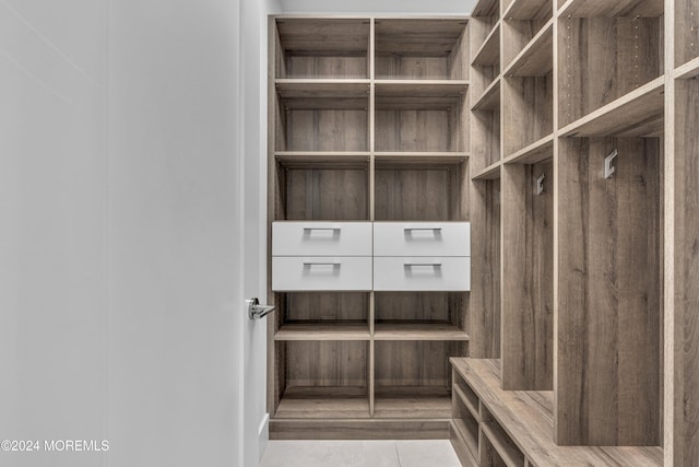 mudroom featuring light tile patterned floors