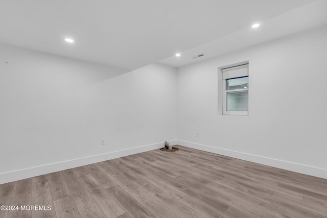 unfurnished room featuring light hardwood / wood-style floors