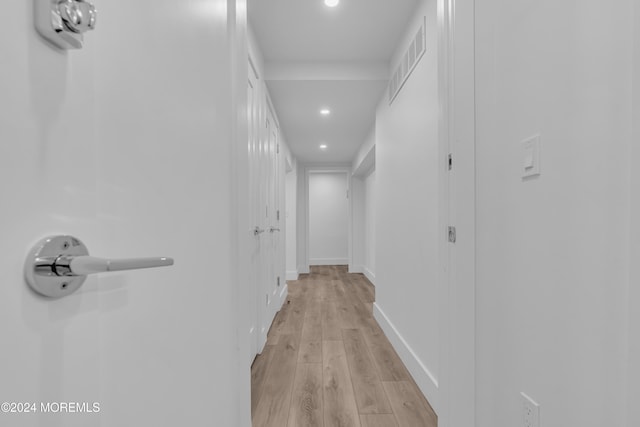 hall featuring light wood-type flooring