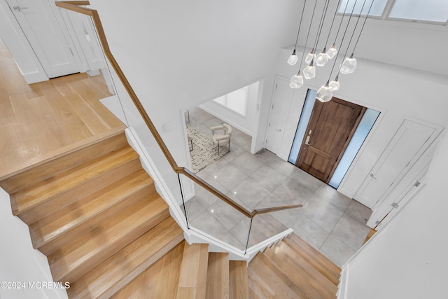 entryway with light tile patterned floors