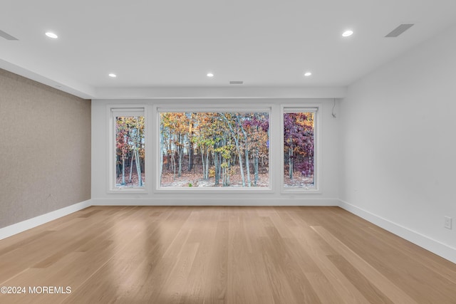 unfurnished dining area with light hardwood / wood-style floors