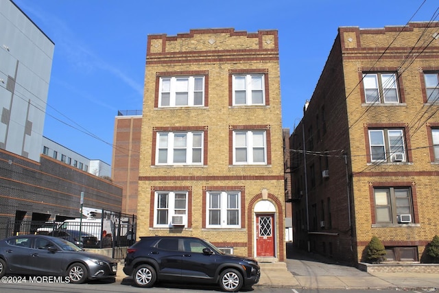 view of front facade featuring cooling unit