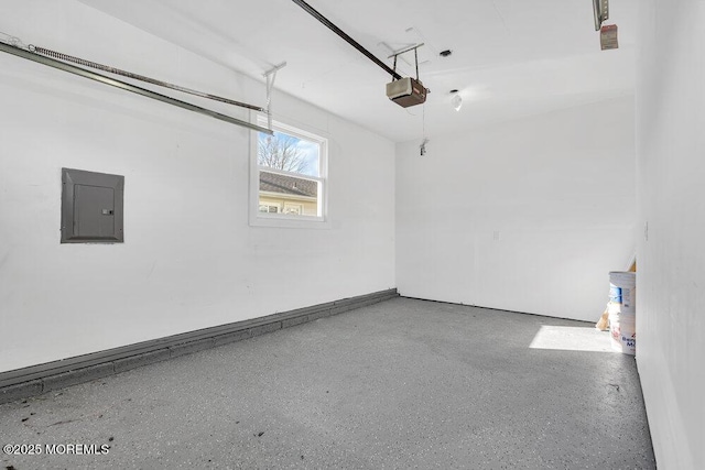 garage featuring electric panel and a garage door opener