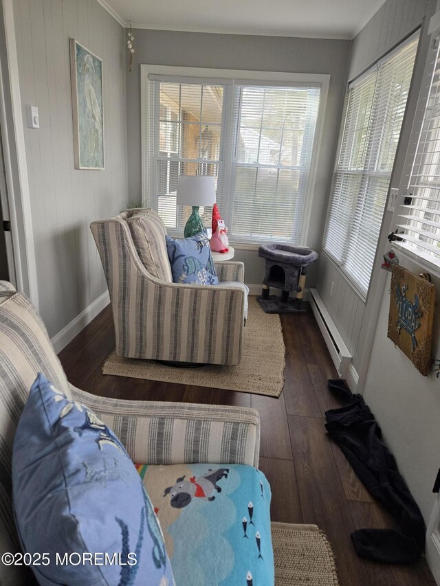 sunroom featuring baseboard heating