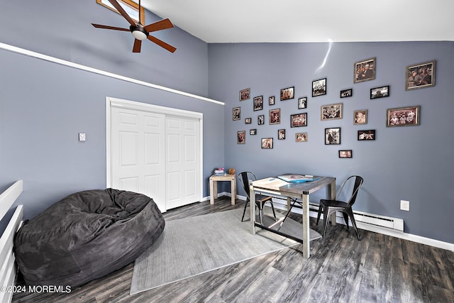 dining room featuring a baseboard heating unit, high vaulted ceiling, ceiling fan, and dark hardwood / wood-style flooring