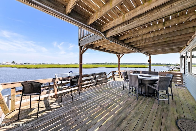 view of dock featuring a deck with water view