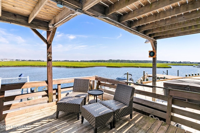 dock area with a water view