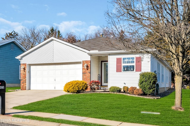 view of front of house featuring a front lawn and a garage