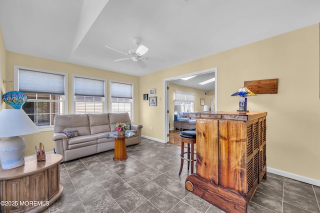 living room featuring ceiling fan