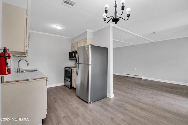 kitchen featuring baseboard heating, an inviting chandelier, light wood-type flooring, appliances with stainless steel finishes, and sink