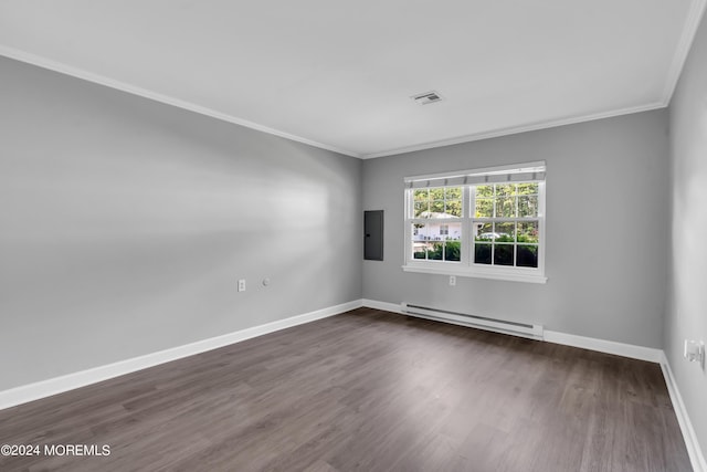 unfurnished room featuring dark hardwood / wood-style flooring, a baseboard heating unit, ornamental molding, and electric panel