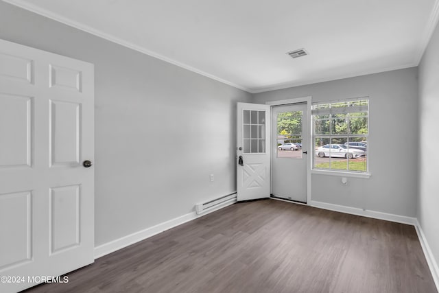 unfurnished room featuring baseboard heating, ornamental molding, and dark hardwood / wood-style floors