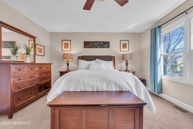 carpeted bedroom featuring ceiling fan