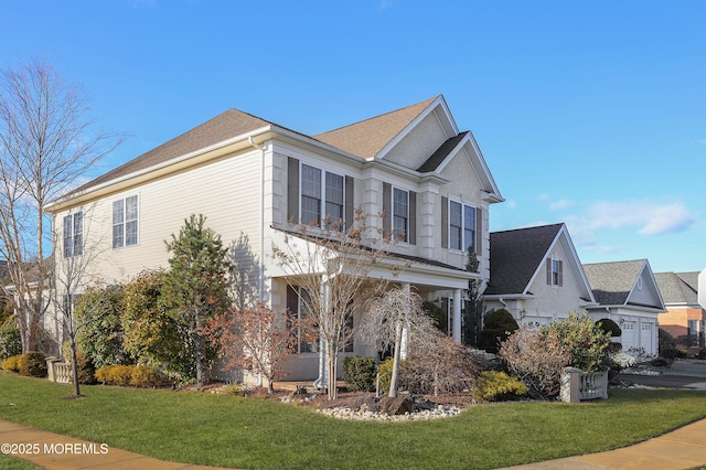 view of side of home featuring a lawn