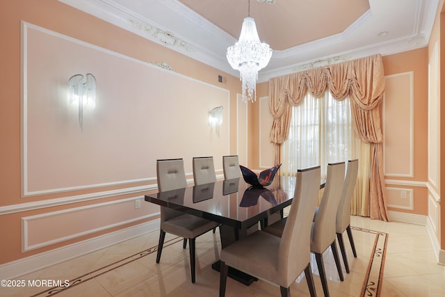 tiled dining room featuring a raised ceiling, a notable chandelier, and ornamental molding