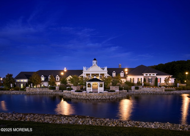 property view of water with a gazebo