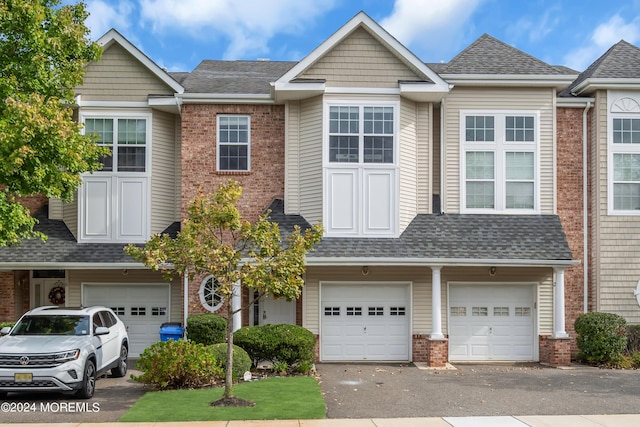 view of property featuring a garage