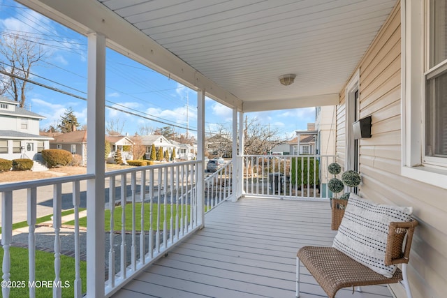 wooden deck featuring a porch