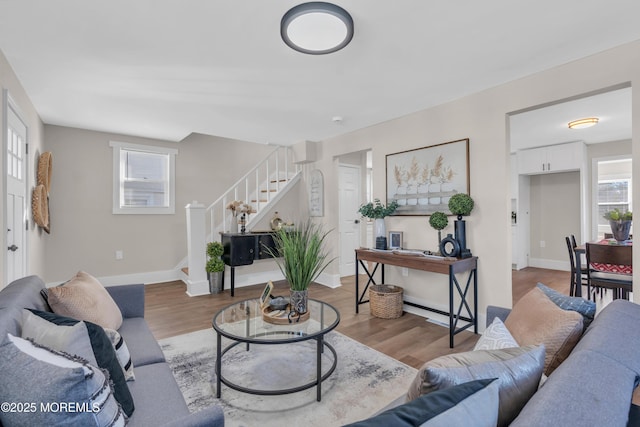 living room featuring a healthy amount of sunlight and wood-type flooring