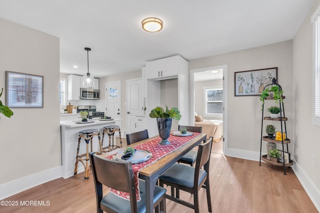 dining area featuring light hardwood / wood-style floors