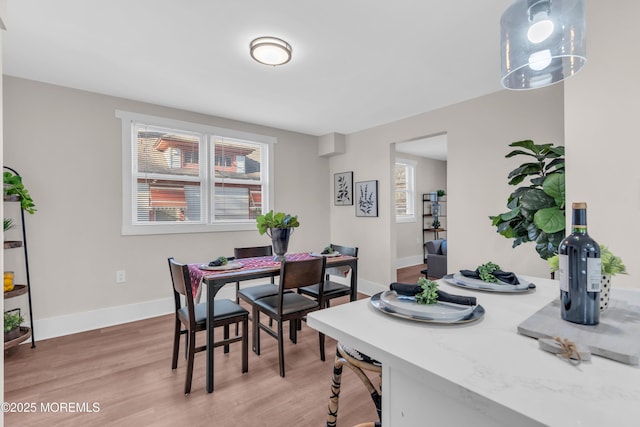 dining room featuring hardwood / wood-style flooring