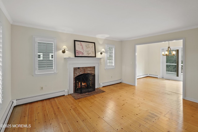 unfurnished living room with light hardwood / wood-style flooring, a brick fireplace, and a baseboard radiator