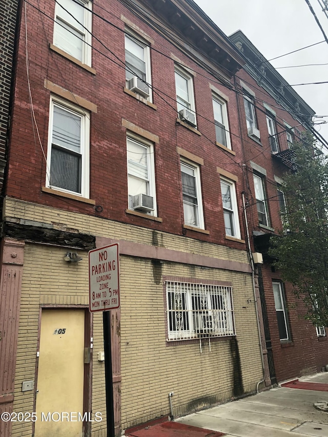 view of building exterior featuring cooling unit