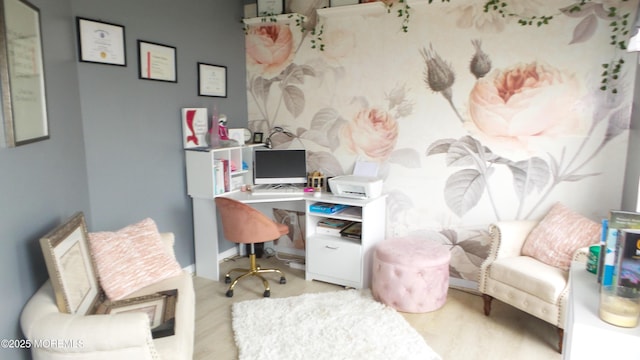 office space with light hardwood / wood-style flooring