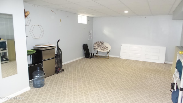 basement with light colored carpet