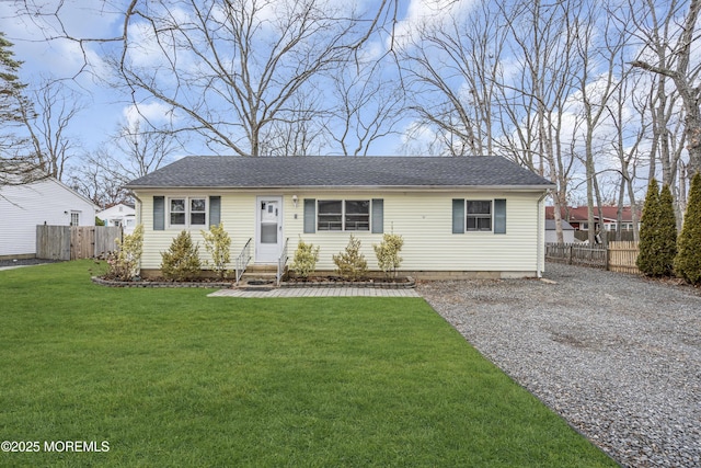 single story home with a front yard