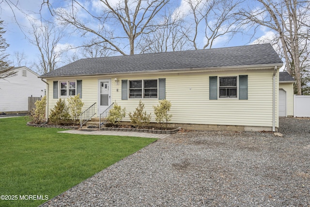 view of front facade featuring a front yard