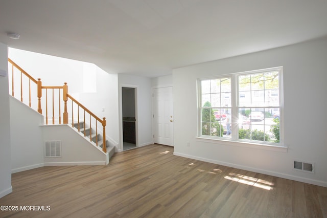 interior space with dark hardwood / wood-style flooring