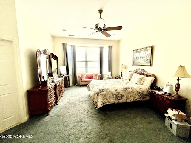 carpeted bedroom featuring ceiling fan