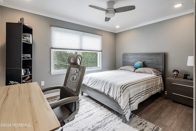 bedroom featuring ceiling fan, wood-type flooring, and ornamental molding