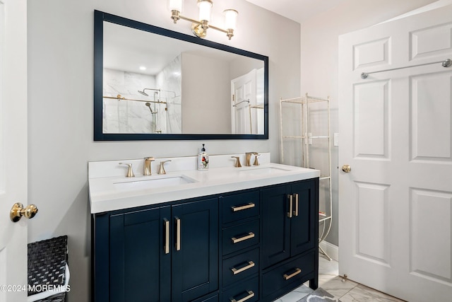 bathroom with vanity and a shower with door