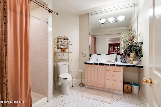 bathroom with toilet, vanity, tile patterned flooring, and a shower with shower curtain