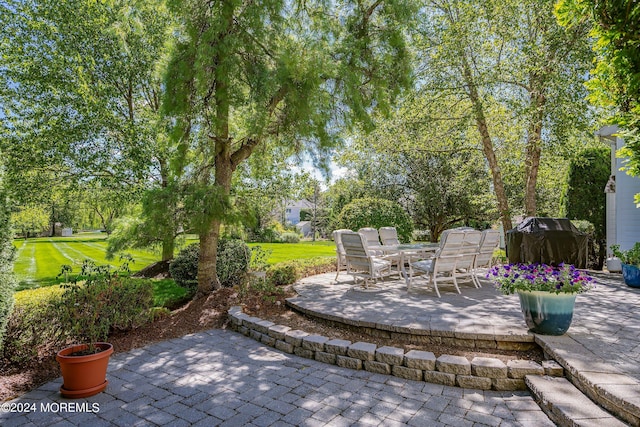 view of patio / terrace with a grill